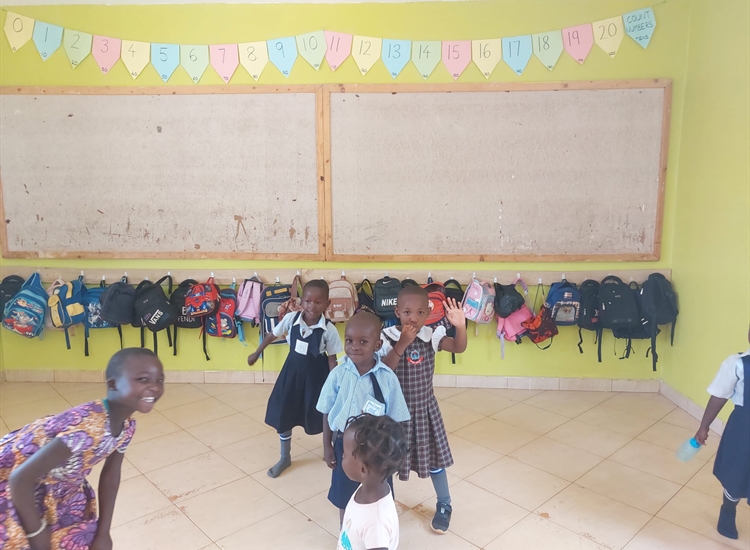 Children testing out hooks for bags
