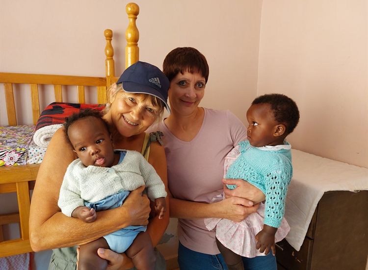 Sally and Kris with Babies